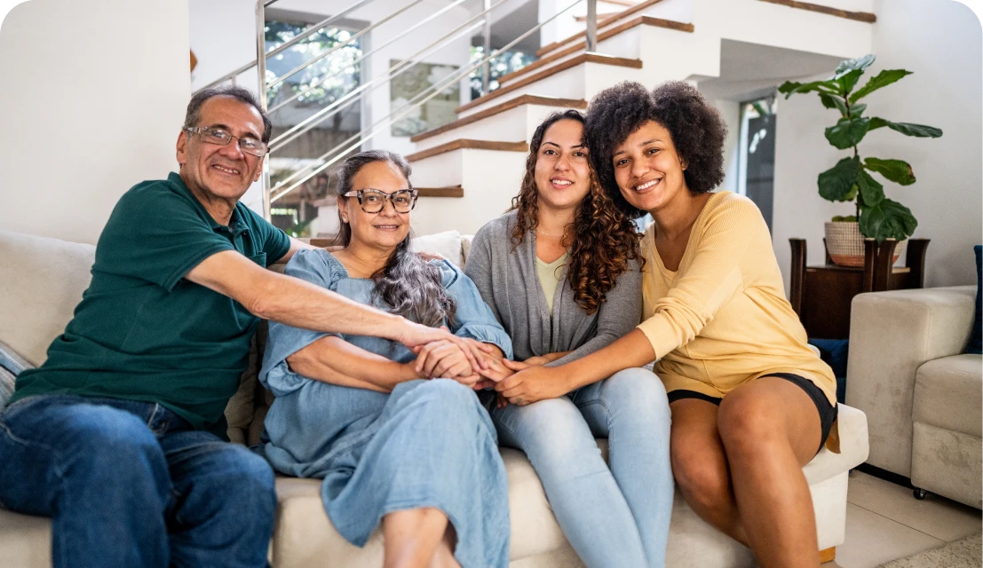 Happy family gathering in cozy home setting.