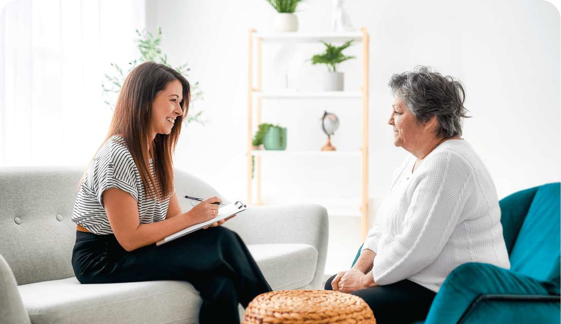 Counseling session between two women indoors