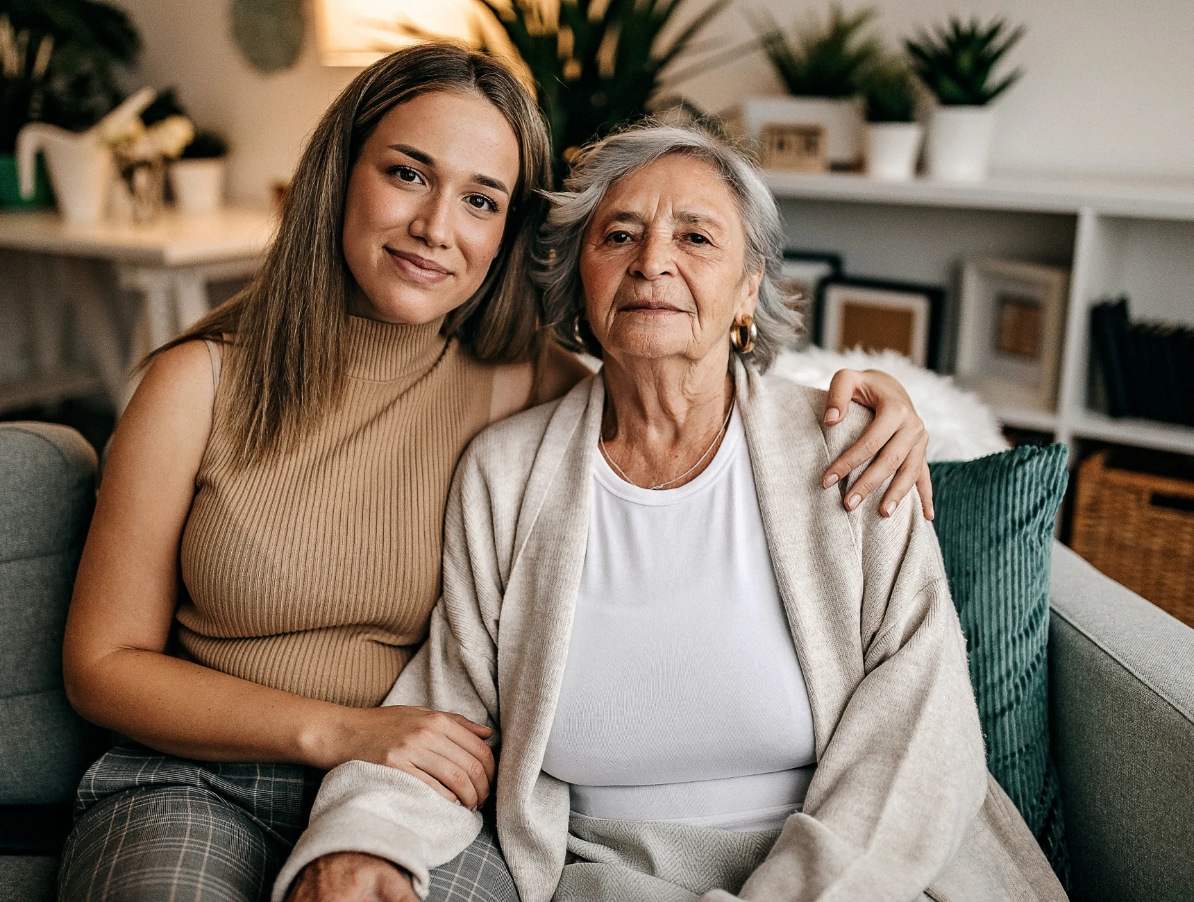 Woman and elderly lady sitting together