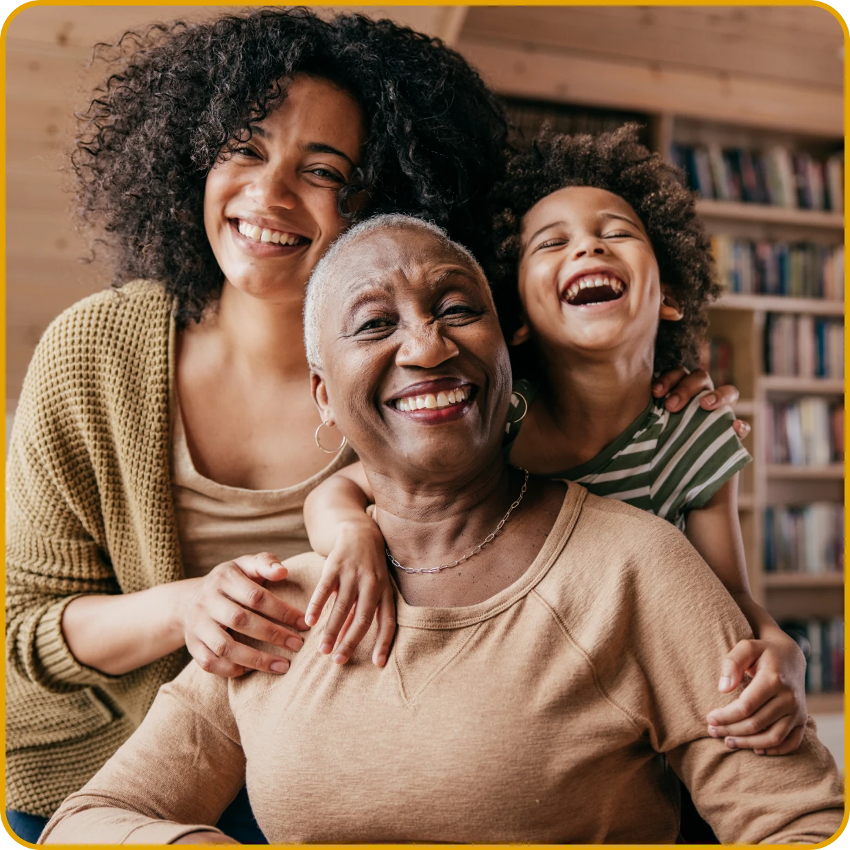 Family portrait with grandmother, daughter, and granddaughter.